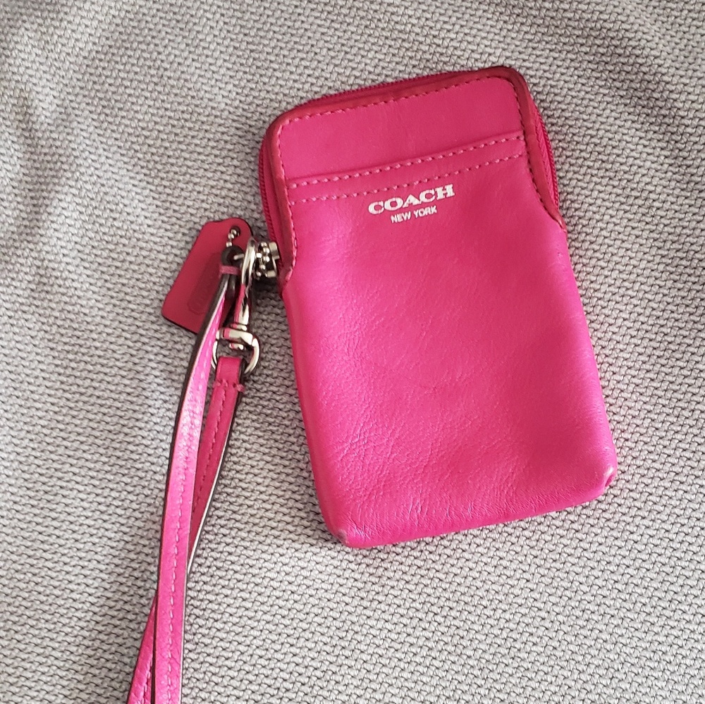 COACH leather phone case wristlet.